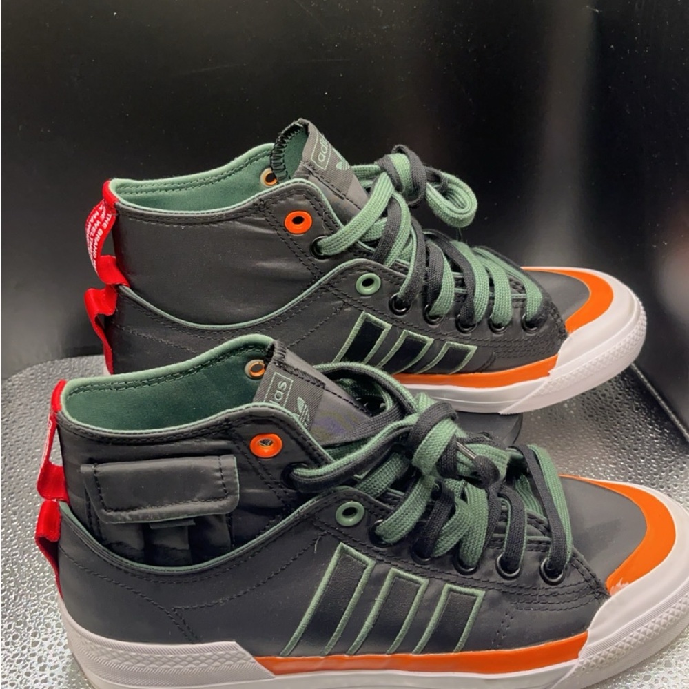 Men’s size 8 adidas with side pocket